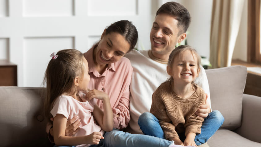Young family sitting together