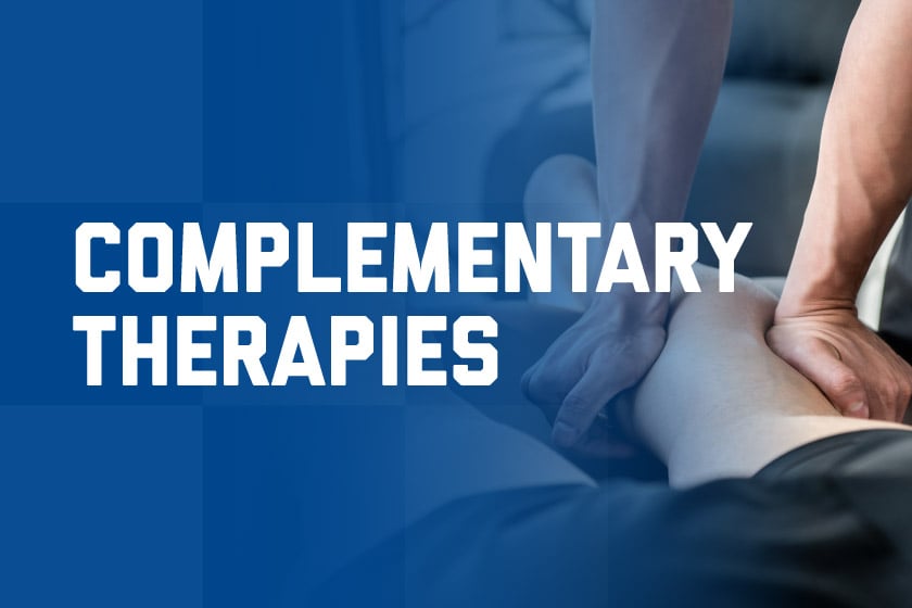 A man receiving a remedial massage on his leg