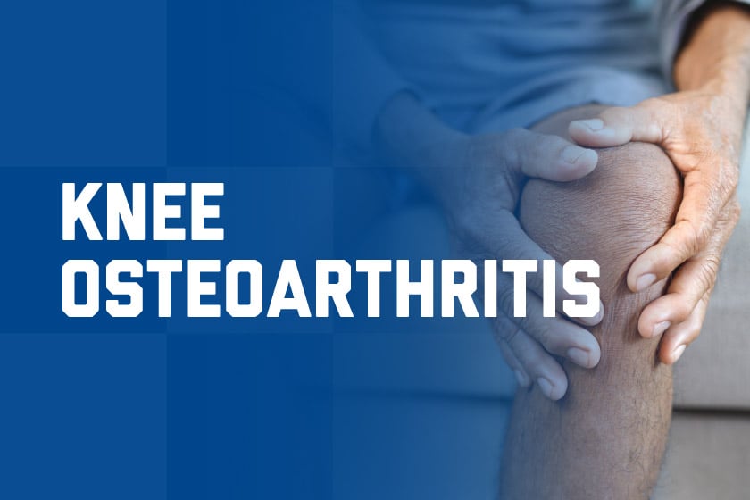 Man holding his knee in pain