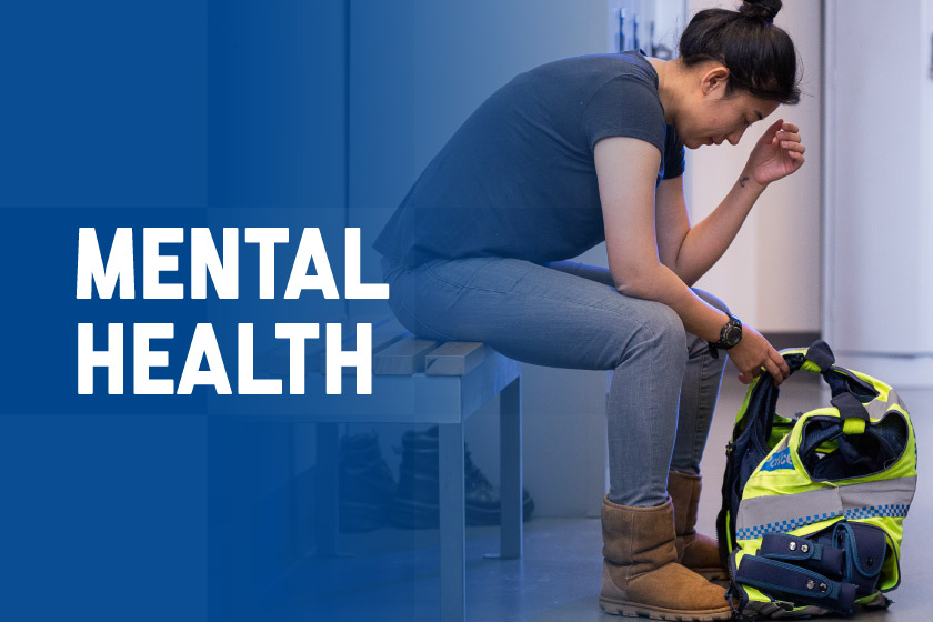 Exhausted police officer sitting in a locker room