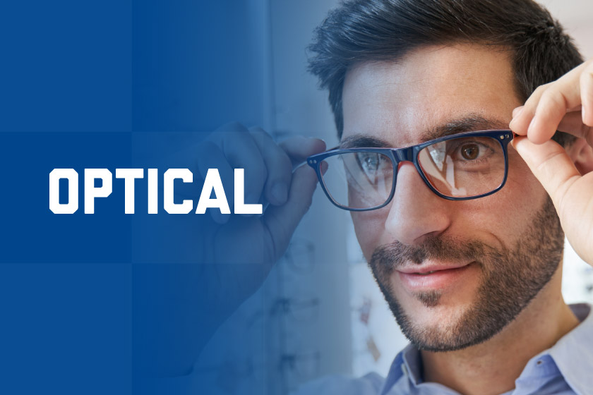 Man trying on optical glasses