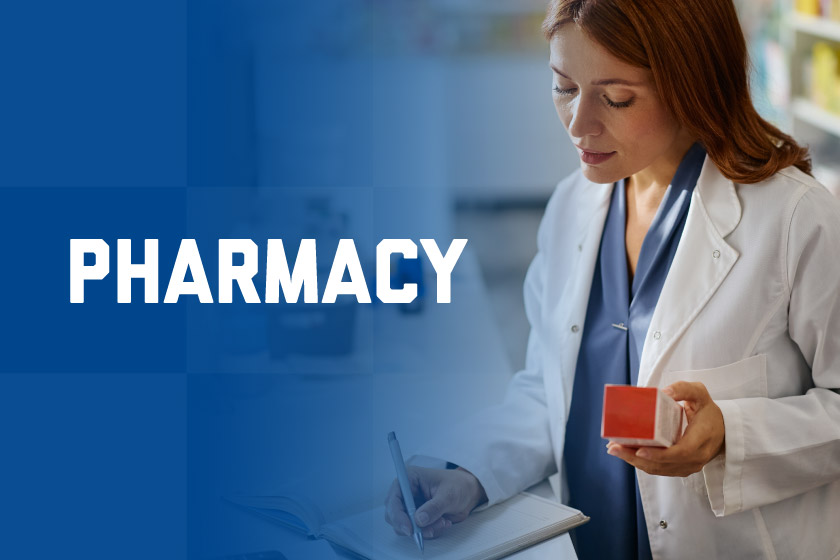 Pharmacist holding medications