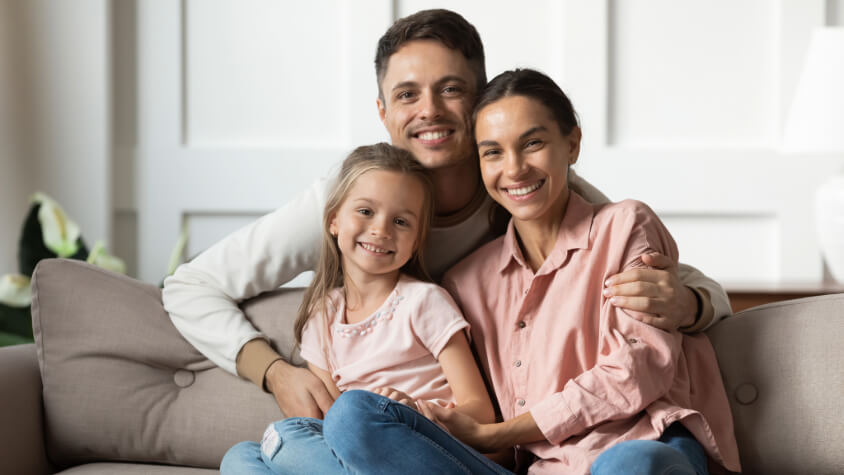 Family of 3 sitting together