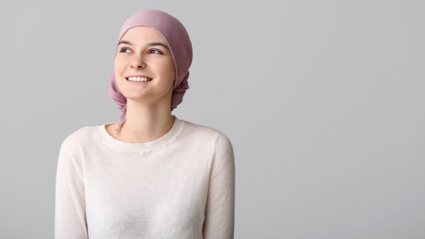 A woman wearing a headscarfe