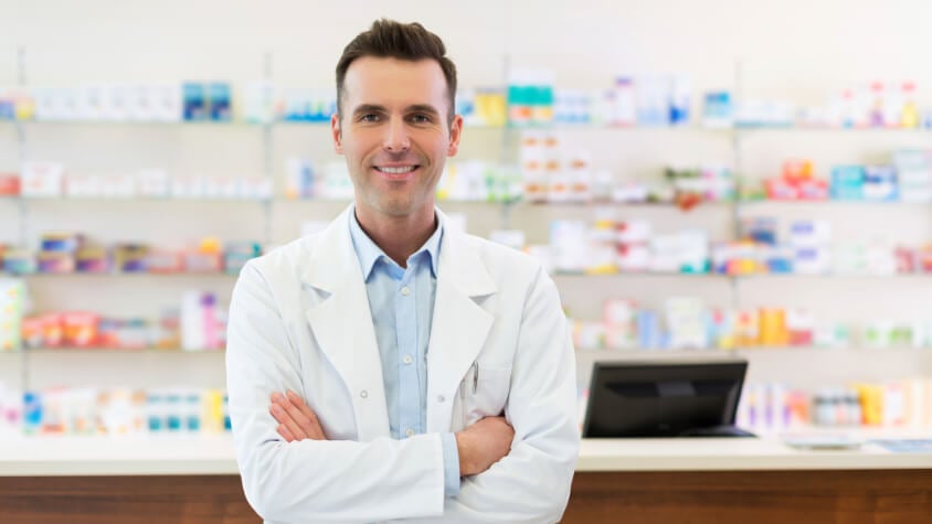 A pharmacist standing