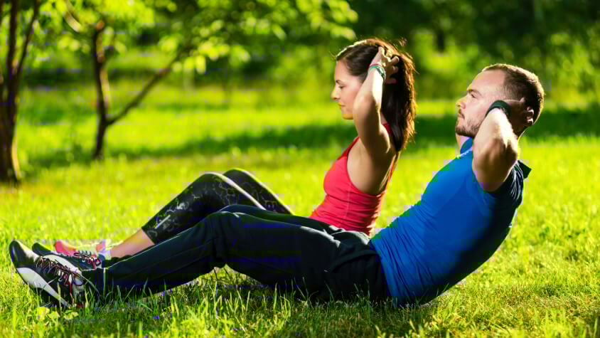 A man and a woman exercising